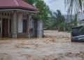 FOTO: Hujan Deras Mengakibatkan Banjir Bandang di Padang